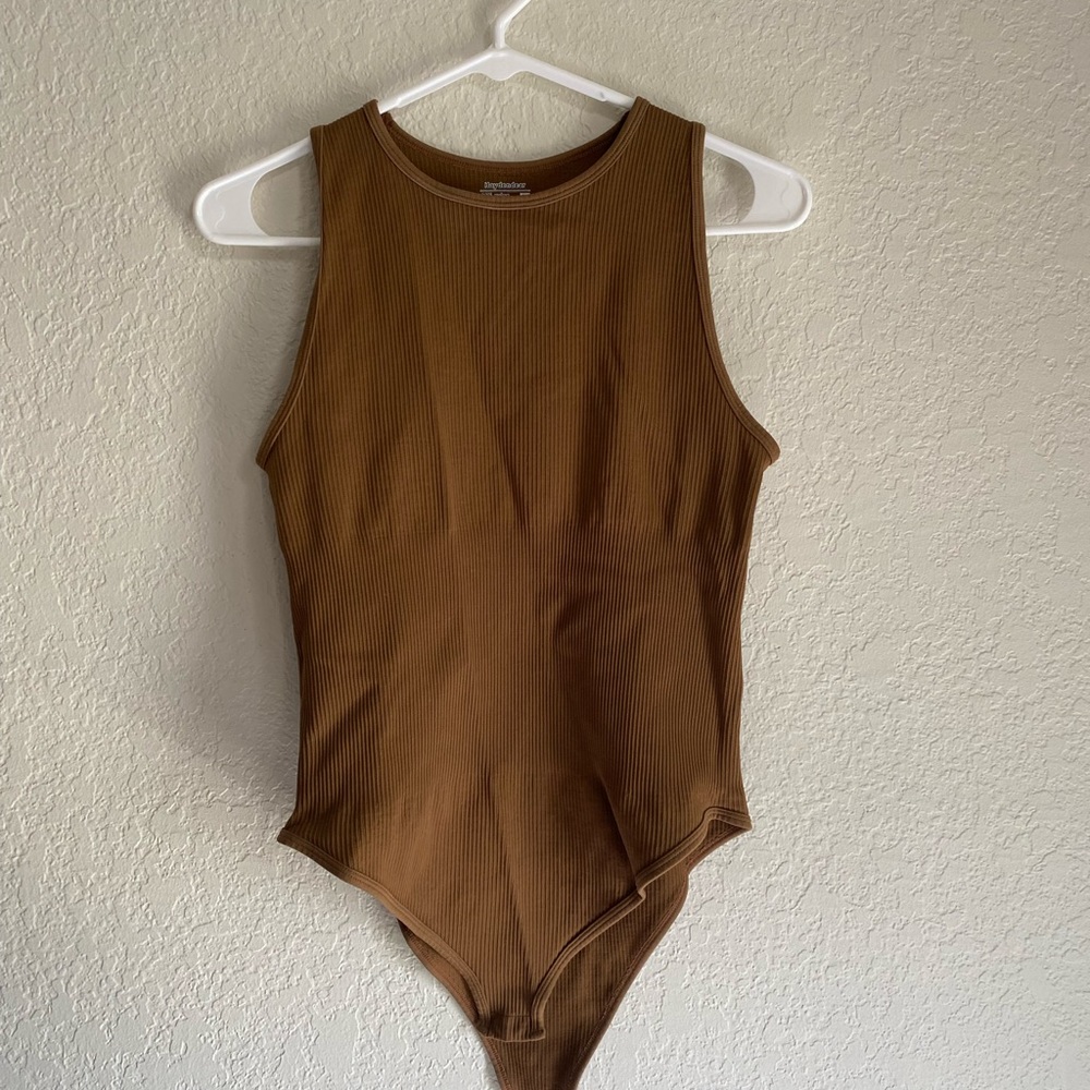 Brown body suit